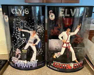 Elvis figures in original packaging, by Elvis Presley Enterprises.