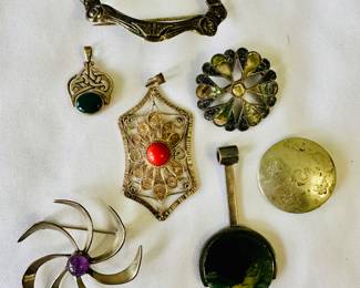Silver brooches, pins and pendants