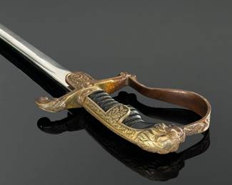 WWII German Lion Head Officers Presentation Sword With Scabbard	Total Sword Length: 35.75in  With Scabbard: 37.5in	124004
