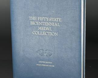 Franklin Mint Sterling Silver 50 State Bicentenial  Medal Collection Complete	Book: 2.5x11.5x14.5in	119042
