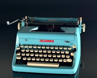 Vintage Royal Quiet DeLuxe Typewriter Aqua Teal	5.5x12.625x11.75in	124065
