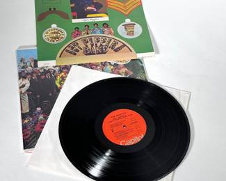 2pc Beatles Records Abbey Road and Sgt. Peppers Lonely Hearts Club Band Lp Capitol	12.25x12.25	119005
