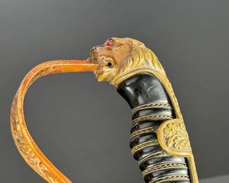 WWII German Lion Head Officers Presentation Sword With Scabbard	Total Sword Length: 35.75in  With Scabbard: 37.5in	124004