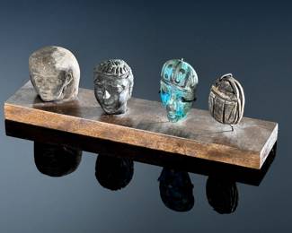 4 piece Egyptian Head and Scarb display	4x10.75x2.5in	124123
