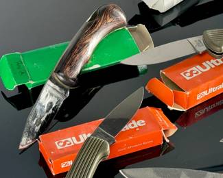 Lot of 12 knives leather sheathes, boxes, pocket knives, some antique	4 to 9 inch knives	115008