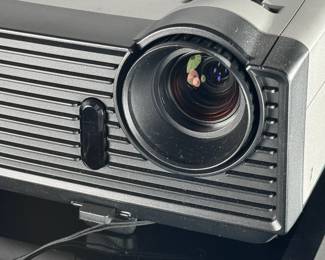 Optoma Home Projector With Case, Chords, and Remote	9.5x8.5x4	115025
