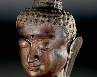 A Sukhothai Style Bronze Head of Buddha	14x11x9in	113098
