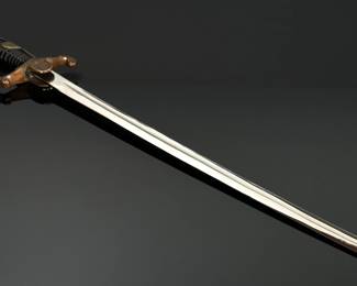 WWII German Lion Head Officers Presentation Sword With Scabbard	Total Sword Length: 35.75in  With Scabbard: 37.5in	124004