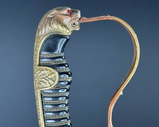 WWII German Lion Head Officers Presentation Sword With Scabbard	Total Sword Length: 35.75in  With Scabbard: 37.5in	124004