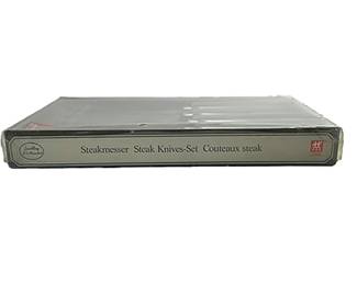 Set of four Zwilling Steak Knives Original box	Box 9.5x5.75. Knife 8.75               Long. Blade 4.5 long	115004
