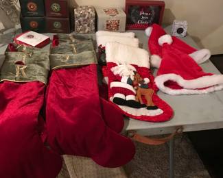 Great elegant stockings and fun Santa Stockings and Hats, Boyds Bears in bock, Hummel and other ornaments. Excellent condition.