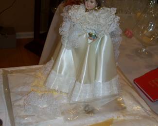 INFANT OF PRAGUE DOLL WITH 3 NEW OUTFITS