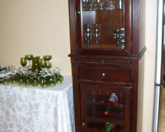 UNIQUE LIGHTED BAR CABINET WITH DRAWER AND PULL OUT COUNTER BY THOMASVILLE
