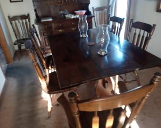 Ethan Allen dark pine dining table and 7 chairs