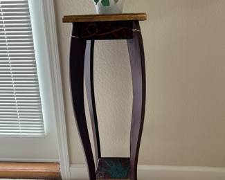 Ornamented plant stand