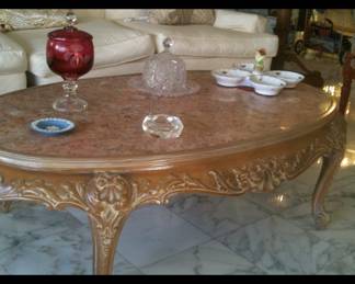 Vintage carved wood oval marble-top cocktail table