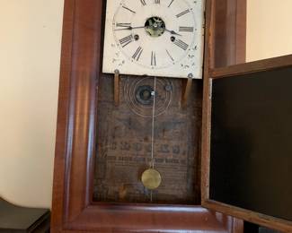 #40 Wood Wall Clock w/eagle painted on front Glass w/flag - New Haven Clock Co. - (has side weights) - 15.5Wx25Tx4D $125.00