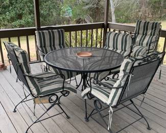 #116 Black Wrought Iron Table w/4 bouncy Chairs - 42x29 $175.00
