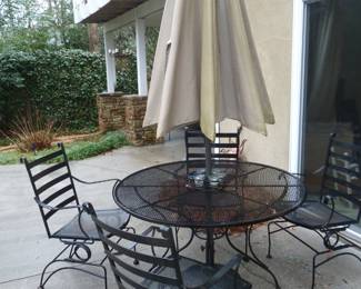 patio table, chairs and umbrella