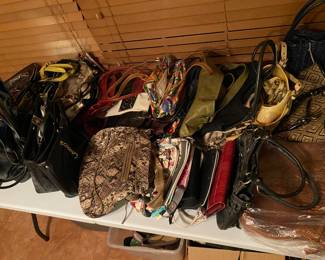 Tons of purses, $20 per, lot of brand names and some are new, happy hunting!