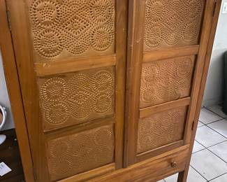 awesome metal inlay armoire. this is a cool piece.