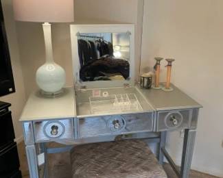 Dressing table - new.  Has phone charger and outlets inside the stand and 2 side drawers.  Stool(s) is sold separately because there are 2 from which to choose.  