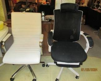 White leather chair.  Black office chair.