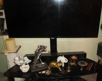 T V - TV stand - sold separately