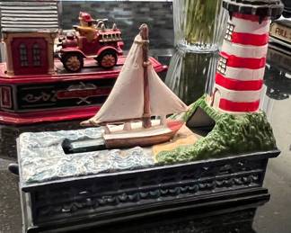 VINTAGE CAST IRON LIGHTHOUSE & SAILBOAT MECHANICAL COIN BANK