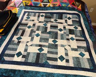 $165- MACHINE AND HAND STITCHED GEOMETRIC LAP QUILT