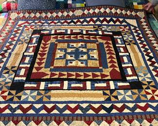$330- Exquisitely designed geometric machine and hand stitched quilt  