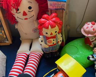 Raggedy Anne Doll with "I Love You" Patch, 1972 Fitz & Floyd Raggedy Andy Vinyl Bank, 1964 Fisher Price Toot - Toot Train Pull Toy