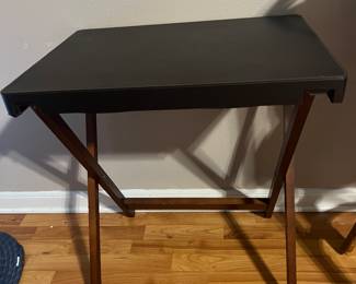 Wood table with leather top. $18. All items available for pre-sale with pre-sale shopping appointments. Please text 985 507-6684 to schedule an appointment to shop before the scheduled sale. 