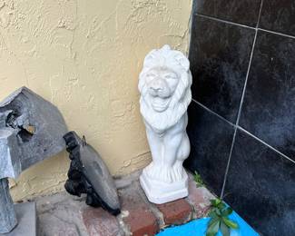 cement lions, Brutalist sculptures