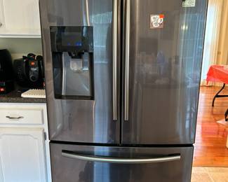 Samsung stainless steel French door refrigerator and drawer freezer