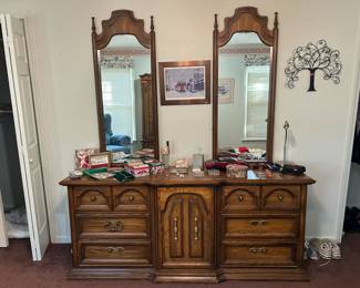 Five-piece bedroom set including two nightstands, armoire, and dresser with two mirrors