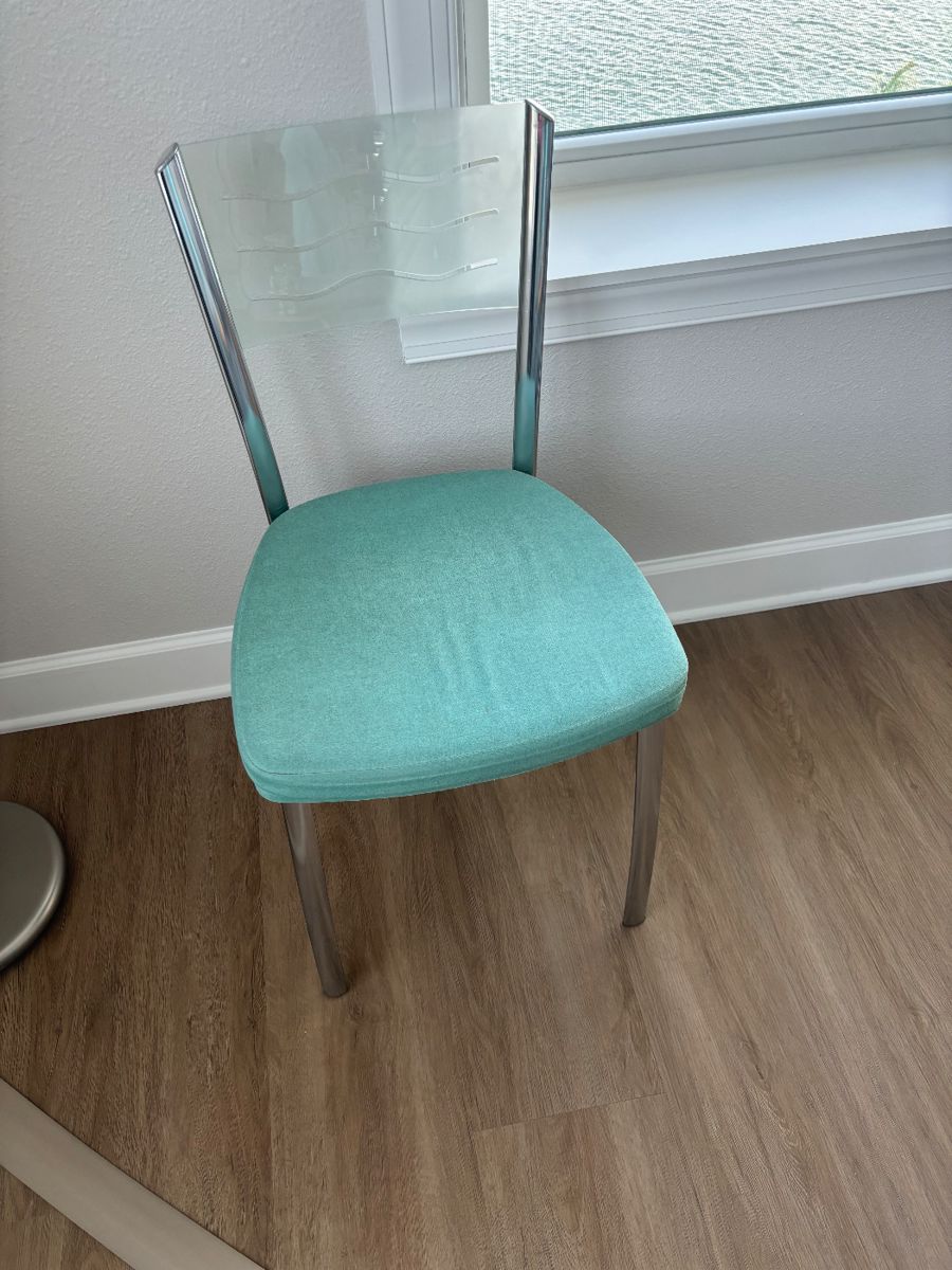 Two chairs one has a small stain the size of a quarter and on the seat $45 for both