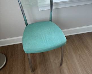 Two chairs one has a small stain the size of a quarter and on the seat $45 for both