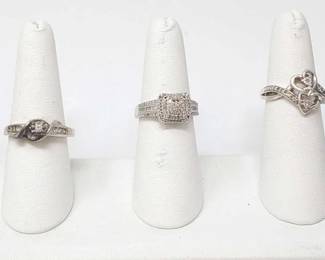 #914 • 3 Sterling Silver Rings with Diamonds
