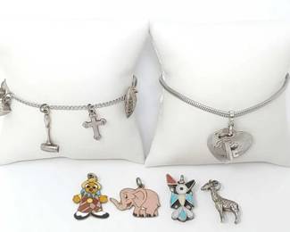 #916 • Sterling Silver Charm Bracelets and Pendants
