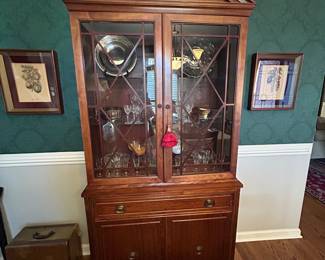Vintage china cabinet with carved eagle