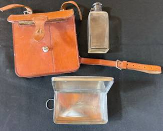 Antique lunch box with leather case
