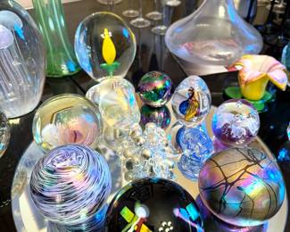 Blown glass paper weights, vases, barware