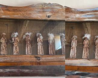 Wooden case with wood carved figures
