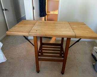 This is great for small kitchen, island butcher block on wheels.