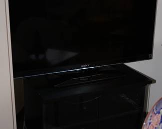 flat screen Sony TV with stand.