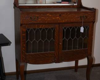 Excellent size early 1900' sideboard with leaded glass.