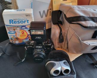 Wii. Minolta Camera. Binoculars.