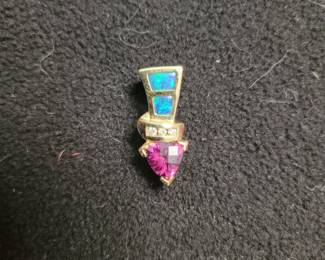 14k, opal and diamond pendant.