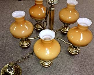 Hanging brass light with 5 amber shades